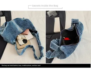 Internal view of blue denim hobo bag showing zipper pocket and spacious capacity