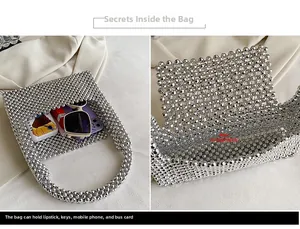 Detail of silver beaded handbag showing spacious interior main pocket and daily essentials