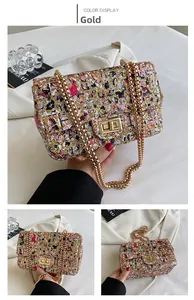 Detailed close-up of a tweed chain bag with gold metallic lock and textured fabric