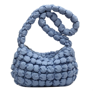 Sky blue bubble textured crossbody bag with matching shoulder strap and silver zipper