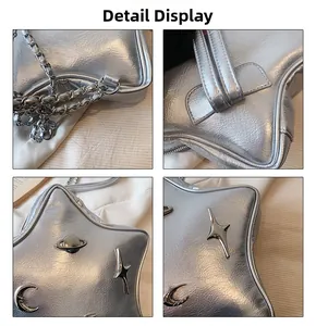 Detail view of silver star shaped crossbody bag with Y2K metallic texture and star charms