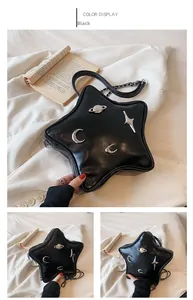 Detailed view of a star-shaped black PU leather bag with silver aerospace theme metal charms