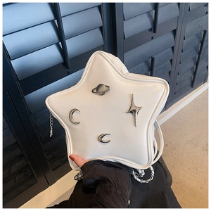 Detail view of white star-shaped PU leather crossbody bag with silver Y2K metal charms
