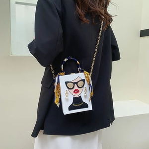 White box bag with fashion illustration, gold chain strap and decorative silk scarf