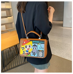 Détail du sac vintage style mexicain avec broderie pop art et bandoulière réglable