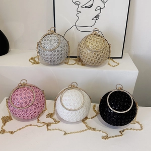 Spherical hollow evening bags with glitter weave texture and metal round handles