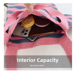 Internal capacity of the striped knit tote bag showing spacious room for daily essentials
