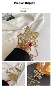 Detailed macro view of the gold star-shaped hollow metal chain bag for women