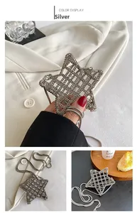 Detailed view of silver star shaped hollow out metal woven shoulder bag with snake chain