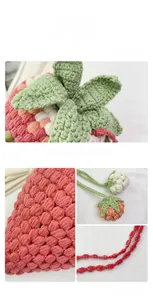 Detailed macro view of handmade crochet strawberry bag with green leaf and knit texture
