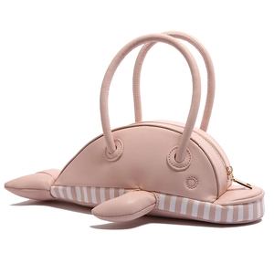Creative pink whale-shaped crossbody bag with gold zipper and stylish metal ring handles