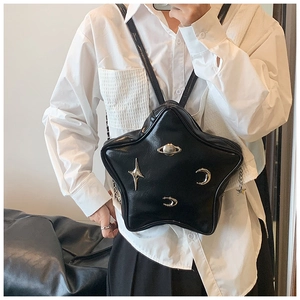 Star-shaped black PU leather backpack detail with silver celestial metal ornaments