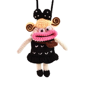 Handmade crochet doll crossbody bag with big pink lips and black bow tie decoration