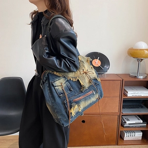 Vintage Messenger-Tasche aus gewaschenem Denim mit vielen Taschen und Used-Look-Finish