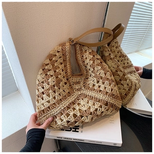 Close-up of beige and brown handmade crochet weave with premium leather shoulder strap