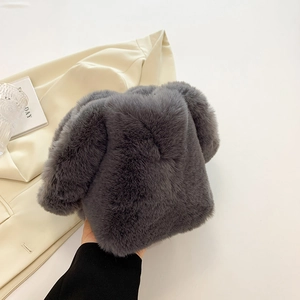 Detailed texture of charcoal grey faux fur plush bag with soft fluffy ears detail