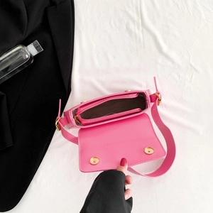 Pink faux leather square crossbody bag with magnetic closure and internal zip compartment