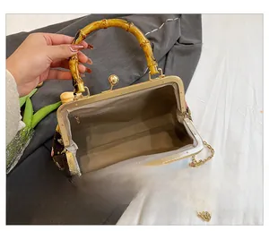 Detail of the internal zipper pocket and fabric lining of this bamboo handle bag