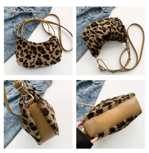 Detailed views of leopard print plush crescent bag with brown leather base and adjustable strap