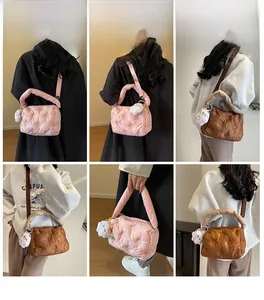 Detailed model views of pink and brown quilted down shoulder bags with rabbit charms