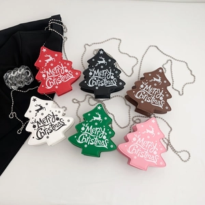 Christmas tree shaped mini crossbody bags with chain straps in six vibrant colors