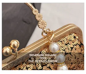Detail of golden sequin evening bag with vintage clasp and detachable strap feature