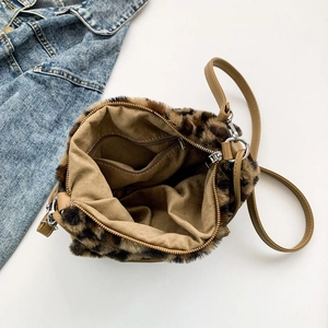 Leopard print faux fur shoulder bag with khaki leather strap and interior pocket