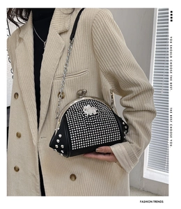 Fashionable black crossbody bag with sparkling elephant rhinestone and silver chain strap