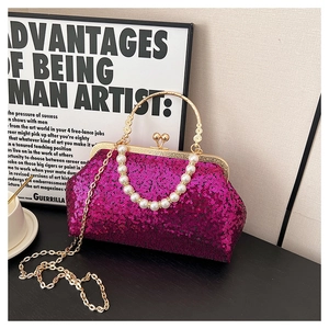 Detail of rose purple sequin evening bag with gold ring handle and pearl strap