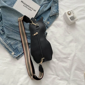 Unique black cat-shaped crossbody chest bag with striped strap on minimalist background