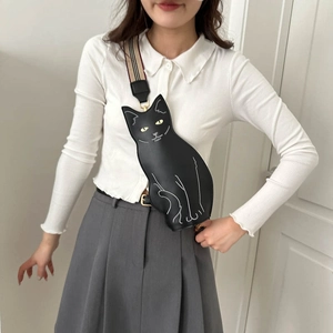 Cute black cat-shaped crossbody bag for women with a classic plaid adjustable strap