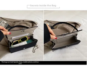 Internal capacity view of black evening bag holding phone, lipstick and sunglasses