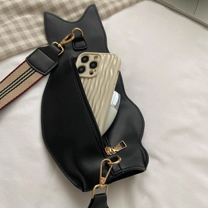Cute black cat-shaped crossbody bag with striped shoulder strap and compact interior