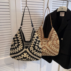 Chic crochet straw hobo bag with contrast colors and leather shoulder straps for women