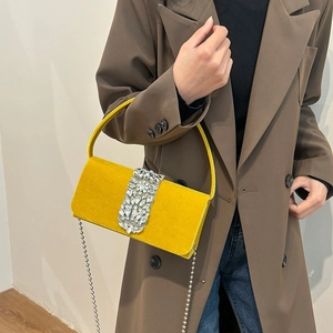 Elegant yellow velvet evening clutch bag with sparkling rhinestone buckle and silver chain