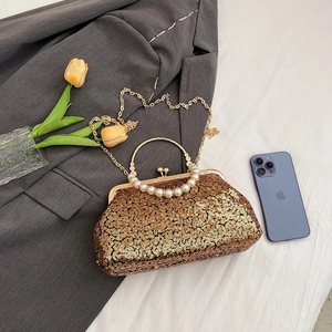 Elegant gold sequin evening bag with pearl ring handle and fine metal chain strap