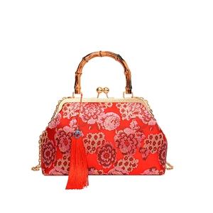 Rote florale Seidenhandtasche mit Bambusgriff und langem rotem Quasten-Accessoire