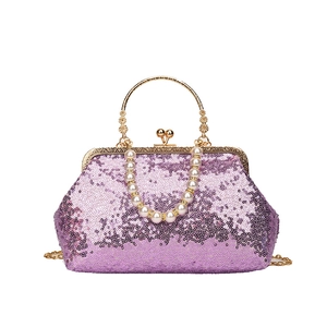 Elegant purple sequined evening handbag with vintage gold frame and pearl handle