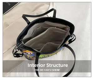 Overhead view of the tote bag interior with zipper compartment and light grey lining
