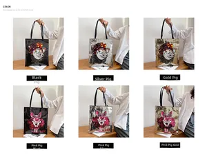 Close-up of sequined tote bags with cartoon pig designs in black, gold, and silver finishes