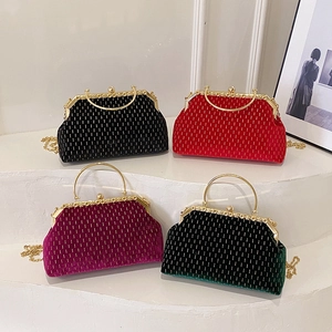Vintage velvet shell evening clutch bags in four colors with gold metal ring handles