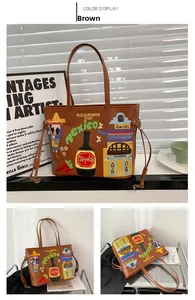 Detailed close-up of brown tote bag with colorful Mexican embroidery and dual handles