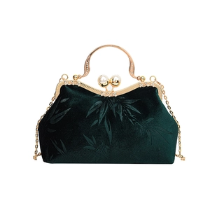 Retro emerald green velvet evening shell bag with bamboo leaf pattern and pearl clasp
