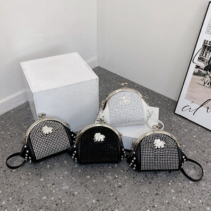 Retro studded shell bag with rhinestones and elephant logo shown in multiple styles