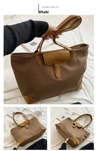 Detailed views of khaki nylon tote bag with leather trim and bottom metal rivets