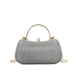 Elegant silver glitter evening clutch with gold metal handle and rhinestone closure