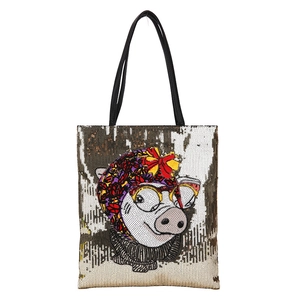 Sparkly sequin tote bag with a cute embroidered pig design and sturdy black handles
