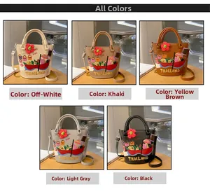 Multiple colors of embroidered bucket bags including cream, tan, and black options
