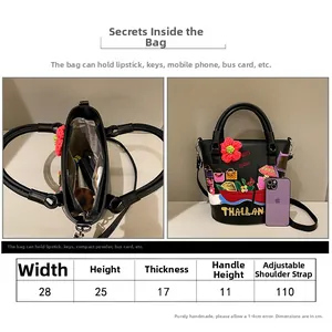 Detailed size chart for the retro floral embroidered bucket bag with internal storage view
