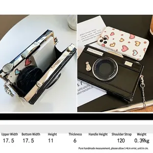 Retro camera-shaped crossbody box bag with metallic chain strap and black finish